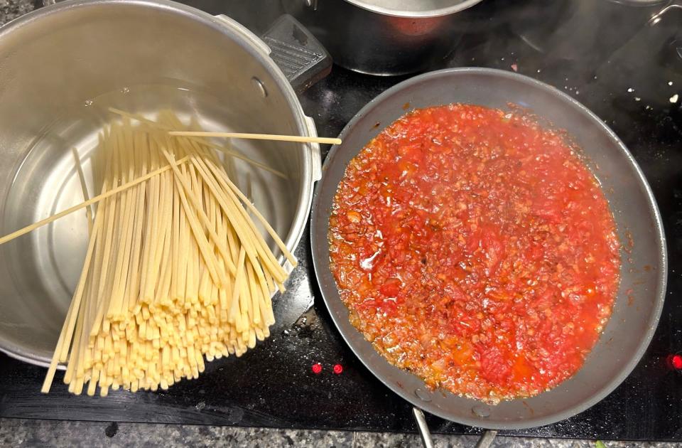 Making the sauce and pasta for Giada De Laurentiis' Bucatini All'Amatriciana pasta