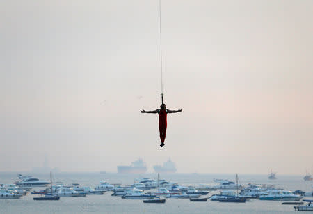 FILE PHOTO: An Indian Navy marine commando demonstrates his skills during a rehearsal ahead of Navy Day celebrations in Mumbai, December 1, 2016. REUTERS/Danish Siddiqui/File Photo