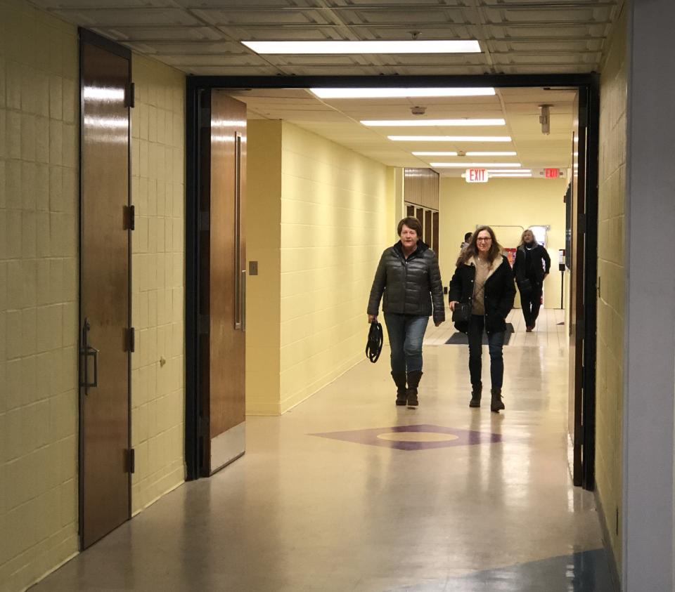 Customers head toward the former Freewill Elementary School cafetorium, which is now home to the new K2 Brothers Brewing tasting room.