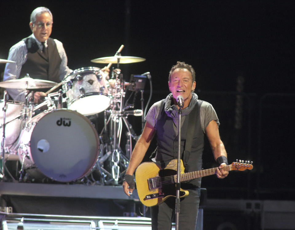 FILE - Max Weinberg, left, and Bruce Springsteen perform with the E Street Band during their "The River Tour 2016" in Baltimore on April 20, 2016. Weinberg, the longtime drummer for Bruce Springsteen and the bandleader for Conan O’Brien’s Late Night and The Tonight Show, has been appointed to a local planning and zoning board in the Delray Beach, Fla., where he lives. (Photo by Owen Sweeney/Invision/AP, File)