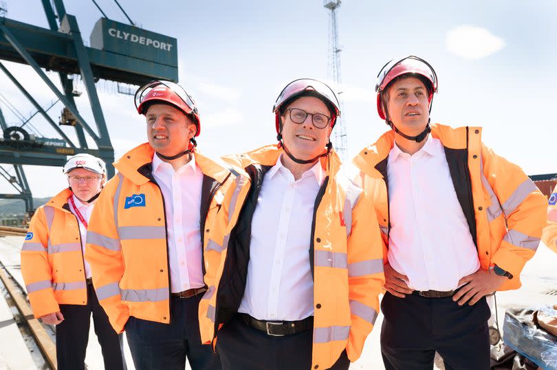 Shadow secretary of state for energy security and net zero Ed Miliband, Labour Party leader Sir Keir Starmer and Scottish Labour leader Anas Sarwar at the Port of Greenock