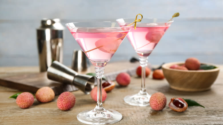 Two lychee martinis with lychees
