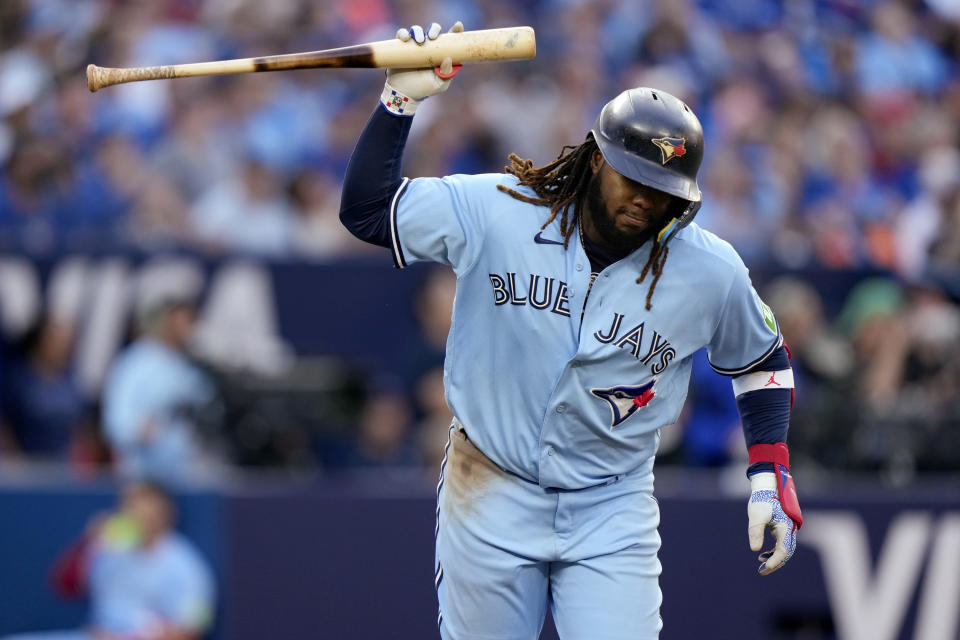 Toronto Blue Jays' Vladimir Guerrero Jr. reacts after popping out during 10th inning against the Tampa Bay Rays in a baseball game in Toronto, Saturday, Sept. 30, 2023. (Frank Gunn/The Canadian Press via AP)