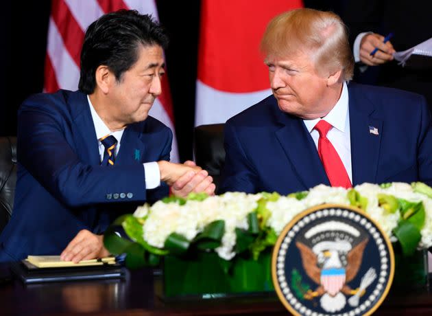 Abe and U.S. President Donald Trump shake hands during a meeting on trade in New York, Sept. 25, 2019, on the sidelines of the United Nations General Assembly. (Photo: Saul Loeb/AFP via Getty Images)