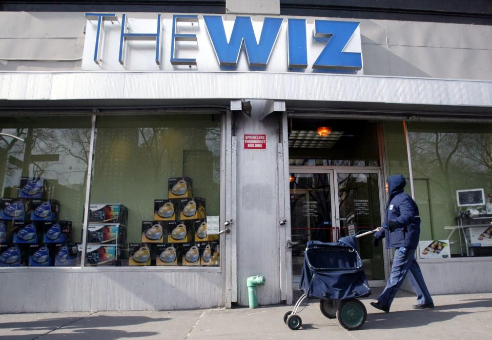 <p>The electronics store first opened in 1977. By 1997, it was the largest consumer electronics store in the country, competing with retailers like Circuit City (another R.I.P.). That same year, the company filed for bankruptcy, <a href="https://www.nytimes.com/1997/12/18/nyregion/wiz-store-closings-are-across-northeast.html" rel="nofollow noopener" target="_blank" data-ylk="slk:blaming overexpanding;elm:context_link;itc:0;sec:content-canvas" class="link ">blaming overexpanding</a> for its downfall. By 2003, those famous "Nobody Beats the Wiz" commercials were gone and the store was, too.</p>