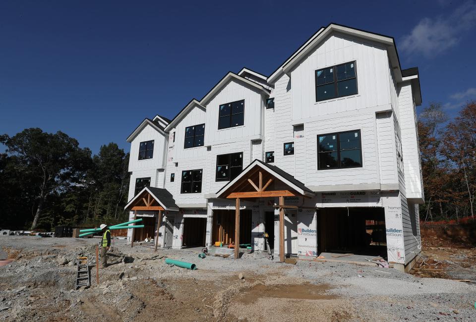 A construction crew works on the ParkVue Townhomes in Crestwood, Ky. on Sep. 28, 2023.