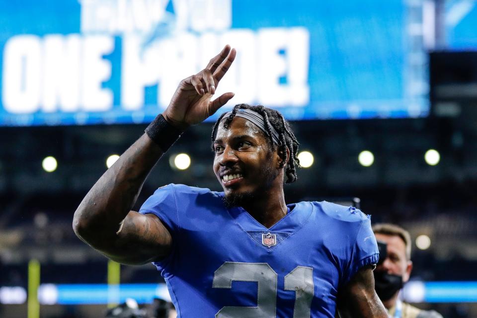 Lions free safety Tracy Walker III waves at fans as he walks off the field after the Lions' 37-30 win over the Packers on Sunday, Jan. 9, 2022, at Ford Field.