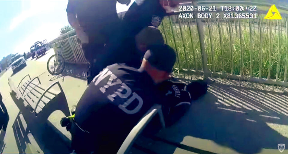 Image: NYPD officer puts man in chokehold (NYPD)