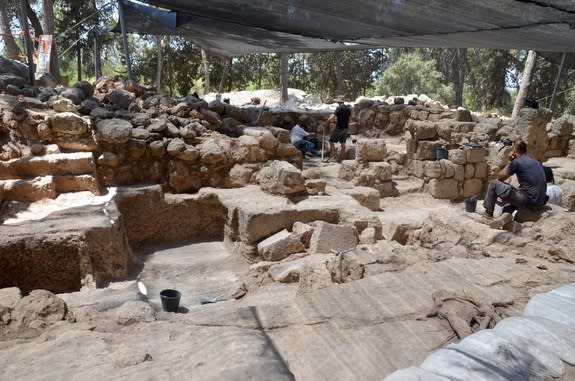 Archaeologists among the stones at Horbat Ha-Gardi, which may hold the ruins of the Tomb of the Maccabees.