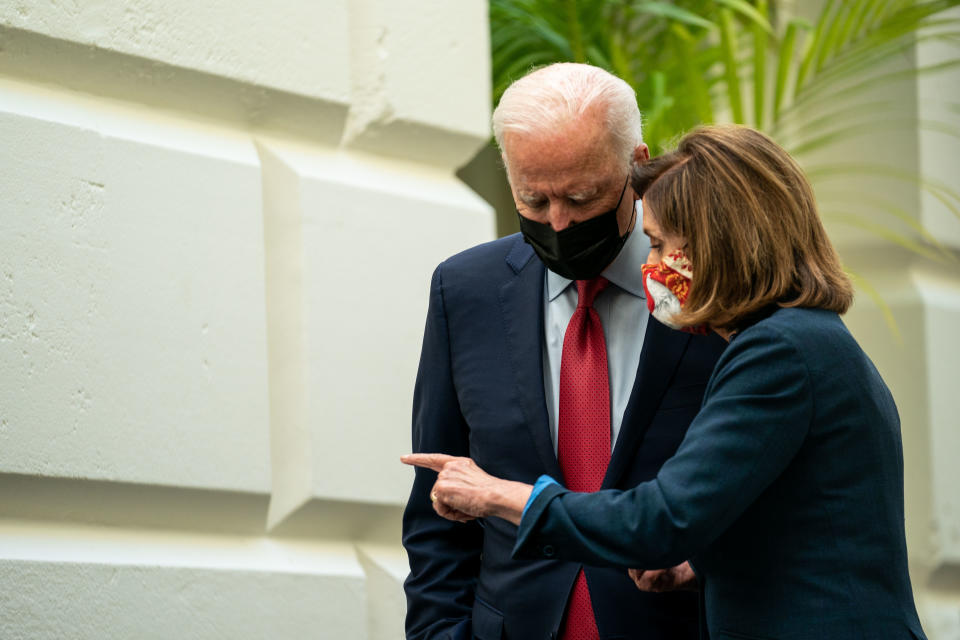 President Joe Biden and Speaker of the House Nancy Pelosi (D-CA) leave a House Democratic Caucus meeting in the U.S. Capitol on Friday, Oct. 1, 2021 in Washington, DC. (Kent Nishimura / Los Angeles Times via Getty Images)