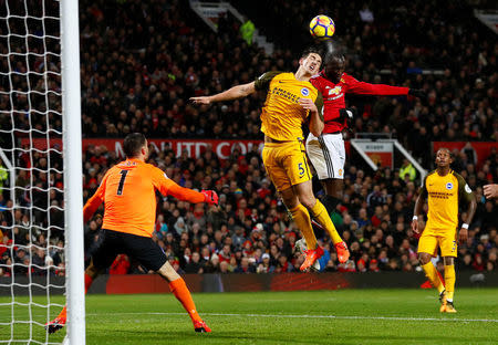 Soccer Football - Premier League - Manchester United vs Brighton & Hove Albion - Old Trafford, Manchester, Britain - November 25, 2017 Manchester United's Romelu Lukaku in action with Brighton's Lewis Dunk Action Images via Reuters/Jason Cairnduff