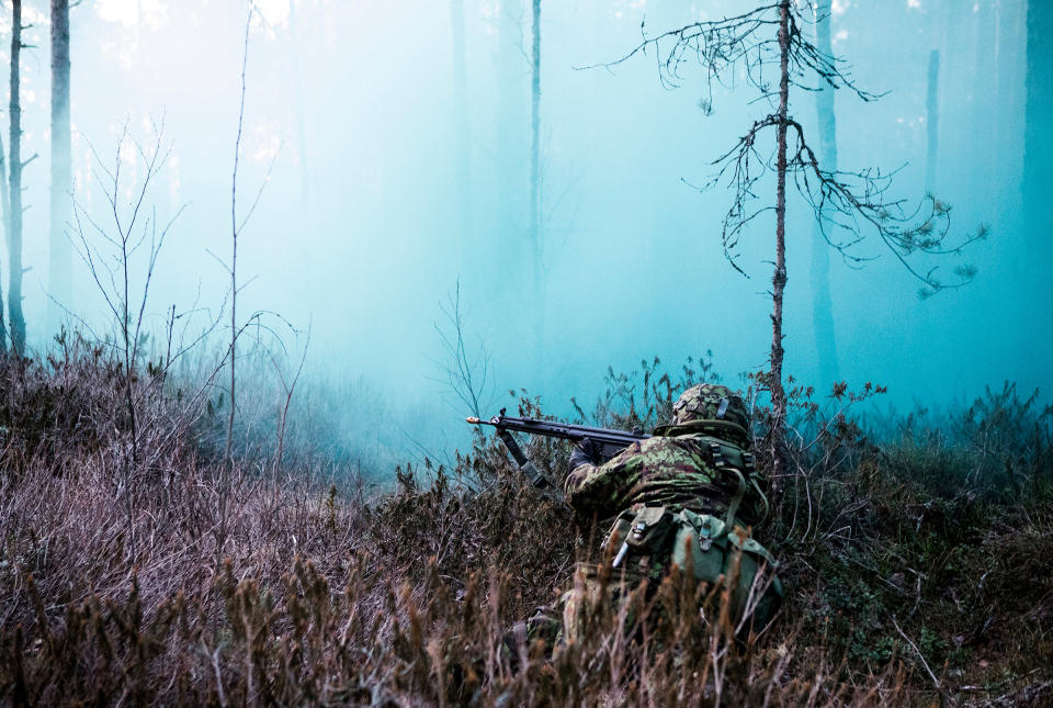 A member of the Estonian Defense League in the forests of Klooga, Estonia on March 27.<span class="copyright">Birgit Püve for TIME</span>