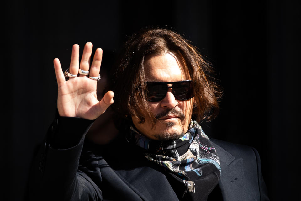 Actor Johnny Depp arrives at the High Court in London for a hearing in his libel case against the publishers of The Sun and its executive editor, Dan Wootton.