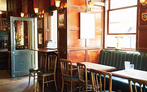 The downstairs pub dining room - Credit: Harriet Clare