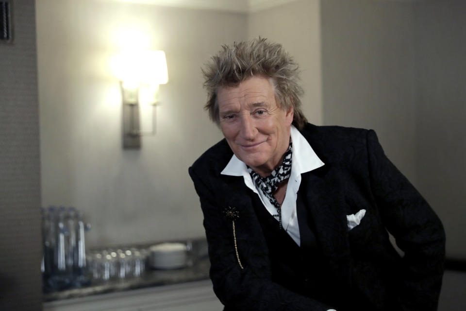 In this photo taken on Thursday, Nov. 14, 2019, British singer Rod Stewart poses for the media after an interview with The Associated Press at a hotel in London. Stewart, known for decades as a consummate crooner, rocker, fashion plate and tongue-in-cheek sex symbol, is adding a new element to his image: serious model railroad builder. The one time front man of The Faces who has hits dating back to the 1960s has put the finishing touch on a 23-year project that has landed him on the cover of Railway Modeller magazine, a far cry from Rolling Stone, whose cover he has graced many times. (AP Photo/Matt Dunham)