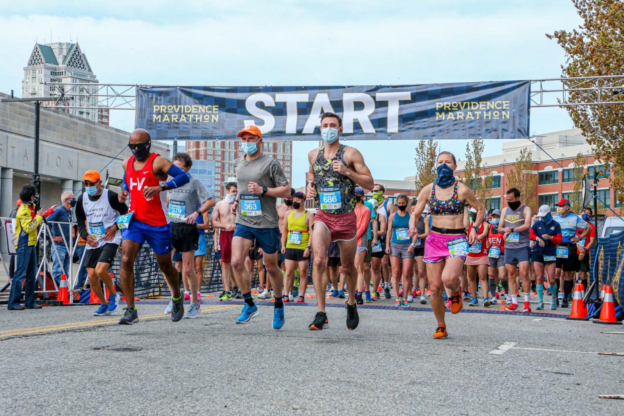 Runners start the Providence Marathon & Half Marathon in 2021. The event, scheduled for May, has been canceled this year.