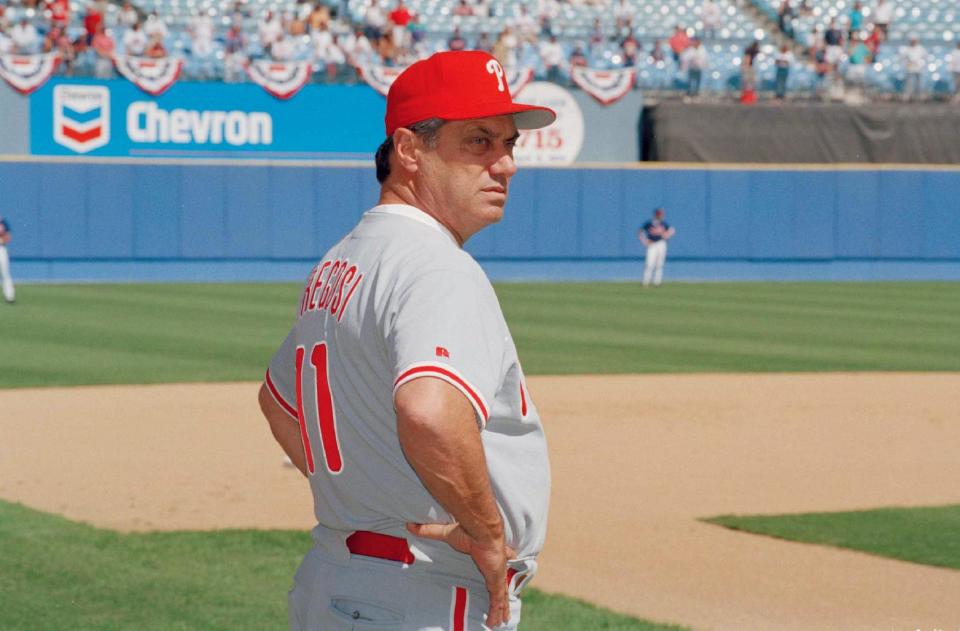 FILE - In this Oct. 9, 1993 file photo, Philadelphia Phillies manger Jim Fregosi watches during batting practice before the start of game 3 of the NLCS in Atlanta. Fregosi, a former All-Star who won more than 1,000 games as a manager for four teams, has died after an apparent stroke. He was 71. The Atlanta Braves say they were notified by a family member that died early Friday, Feb. 14, 2014, in Miami, where he was hospitalized after the apparent stroke while on a cruise with baseball alumni. (AP Photo/Ed Reinke)