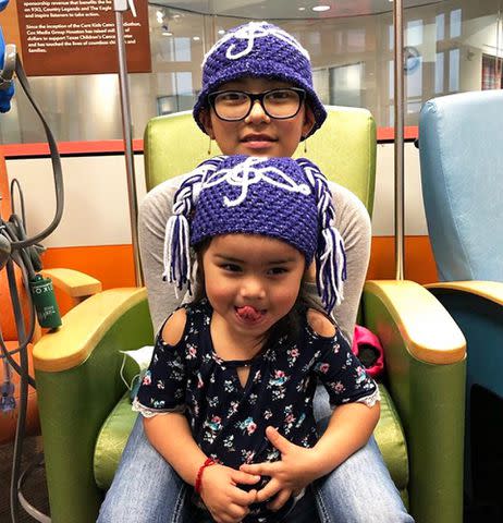 <p>Courtesy of Texas Childrens Hospital</p> Britney Moyeda and one of her younger sisters in 2018