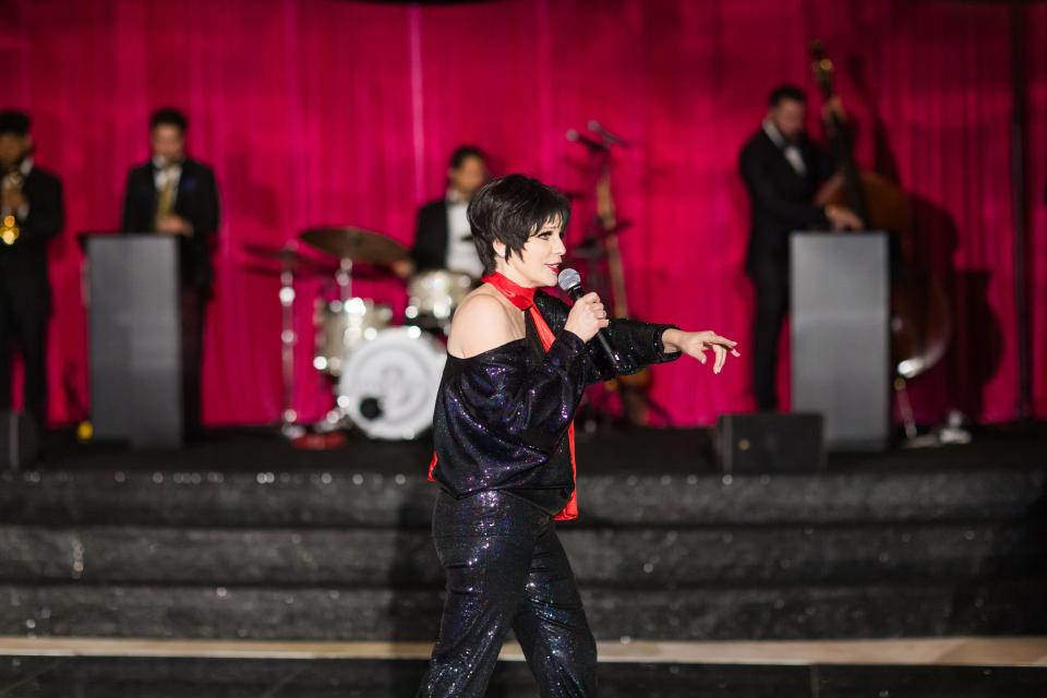 A Liza Minnelli impersonator performs "Cabaret" at "Glitz, Glamour & Muses," the Muses annual fundraiser on Feb. 20, 2024.