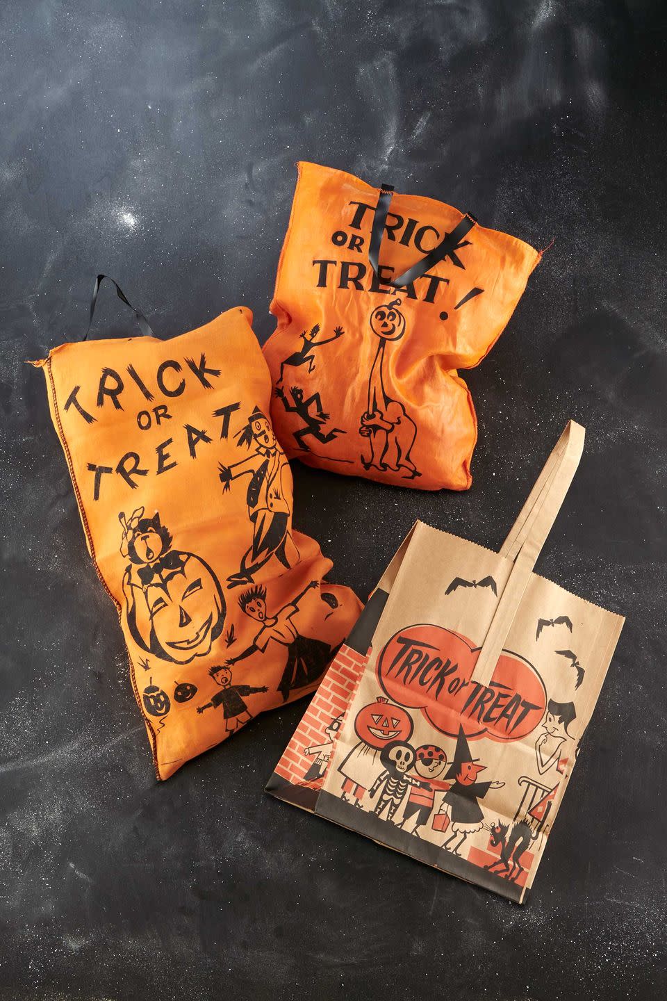 <p>Midcentury paper trick-or-treat bags sold for pennies at the local five-and-dime, as folks would later fill them with Bazooka Joe, Tootsie Pops, and Baby Ruths. "These days, expect to pay about $30 for a 1950s sack with a simple image, such as a jack-o'-lantern," says Bruce Elsass, one of the nation's preeminent collectors of Halloween accessories. </p>