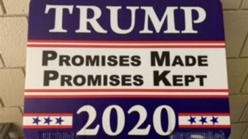 The campaign sign read: “Promises made, promises kept