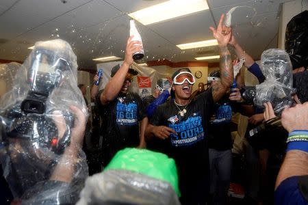 Sep 30, 2015; Baltimore, MD, USA; Toronto Blue Jays celebrate winning the A.L. East division after game two of a double header in the visiting locker room at Oriole Park at Camden Yards. The Toronto Blue Jays clinched the division after game one of the double header. Tommy Gilligan-USA TODAY Sports