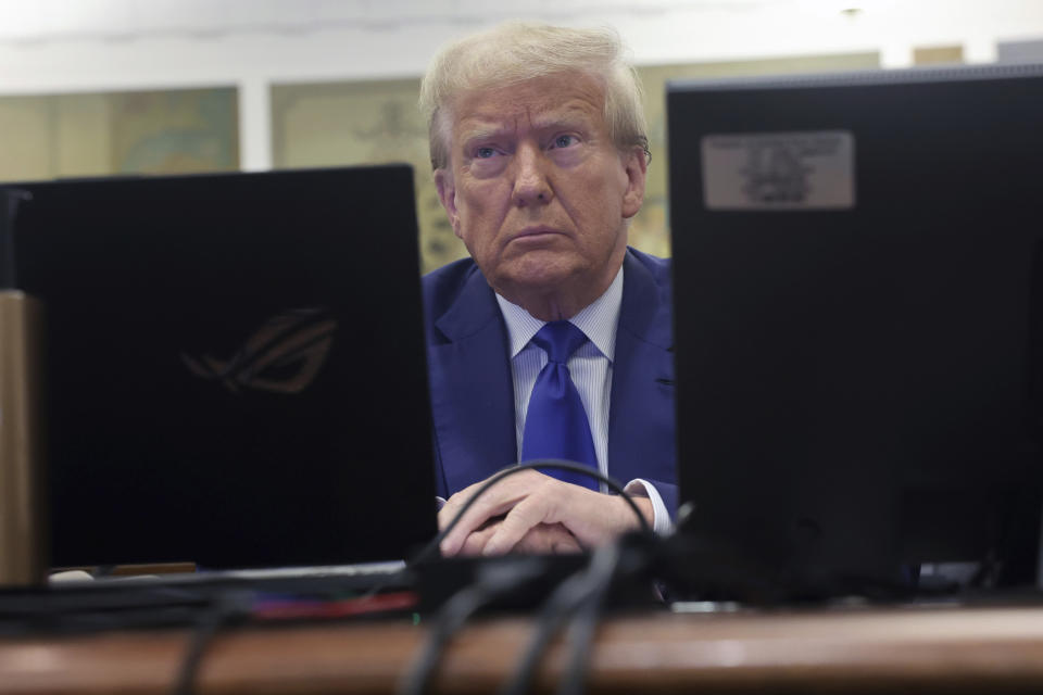 Former President Donald Trump waits for the continuation of his civil business fraud trial at New York Supreme Court, Wednesday, Oct. 25, 2023, in New York. (Spencer Platt/Pool Photo via AP)