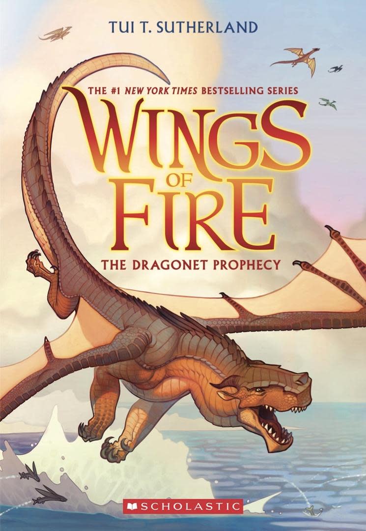cover photo of Wings of fire book with reddish brown lettering and a photo of an animated brown dragon