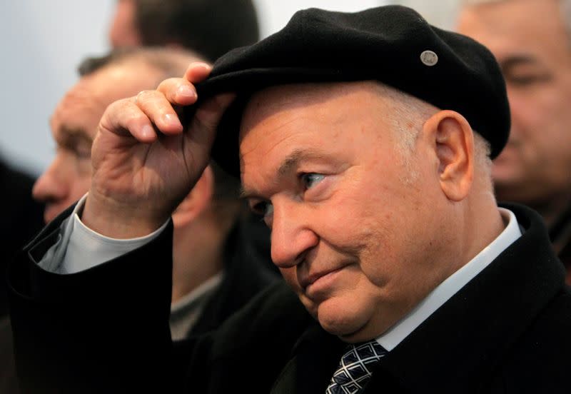 FILE PHOTO: Yuri Luzhkov, who has died aged 83, is seen attending a ceremony when he was Moscow mayor to start the construction of a new section of the city underground railway