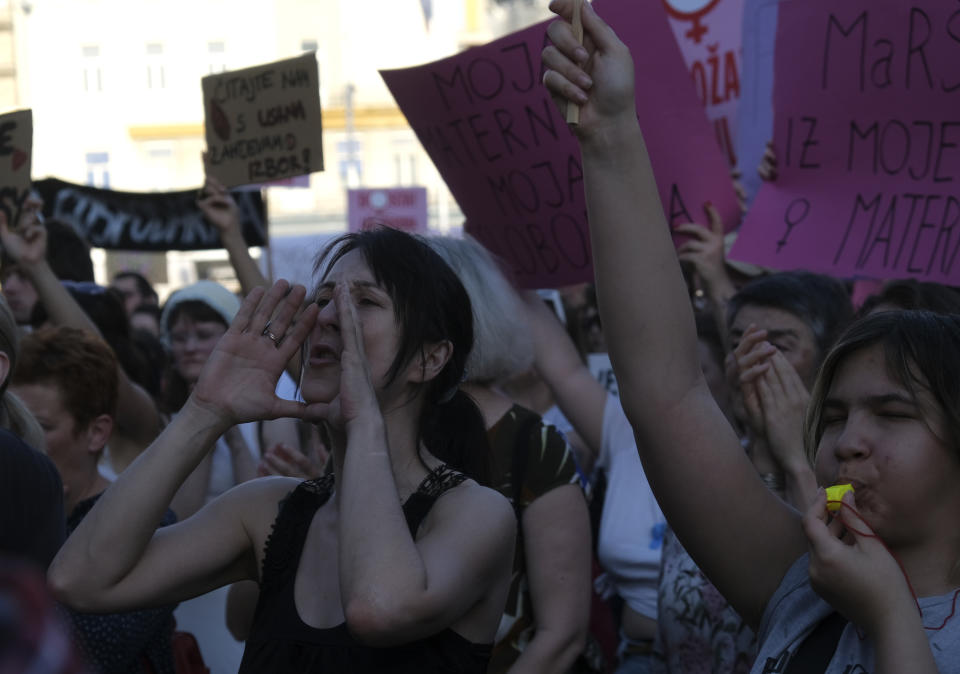 People attend a protest in solidarity with a woman who was denied an abortion despite her fetus having serious health problems, in Zagreb, Croatia, Thursday, May 12, 2022. The case has sparked public outrage and rekindled a years-long debate about abortion in Croatia, a member of the European Union. (AP Photo)