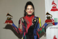 Rosalia poses in the press room with awards for best alternative song and best urban fusion/performance for "Malamente" at the Latin Grammy Awards on Thursday, Nov. 15, 2018, at the MGM Grand Garden Arena in Las Vegas. (Photo by Eric Jamison/Invision/AP)