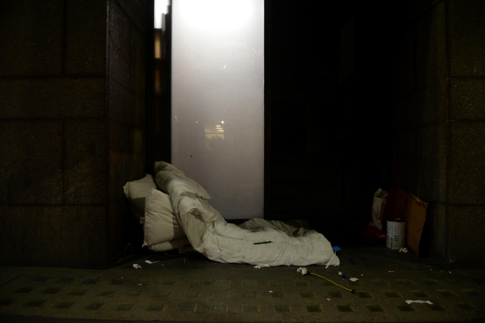 Bedding belonging to a homeless person lies in a nook in Moorgate in the City of London, in London, Britain, October 17, 2017. REUTERS/Mary Turner  SEARCH "TURNER HOMELESS" FOR THIS STORY. SEARCH "WIDER IMAGE" FOR ALL STORIES.
