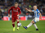 Soccer Football - Premier League - Huddersfield Town v Liverpool - John Smith's Stadium, Huddersfield, Britain - October 20, 2018 Liverpool's Xherdan Shaqiri in action with Huddersfield Town's Aaron Mooy Action Images via Reuters/Carl Recine