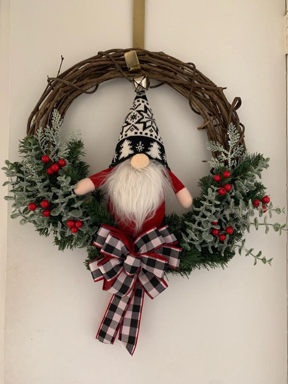 Wreath-maker Mary Beth Kelly is one of the crafters at the 2023 Christmas arts and crafts fair at B.M.C. Durfee High School in Fall River.