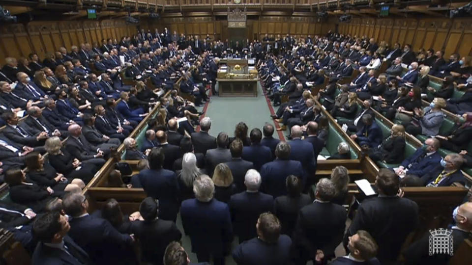 In this image from video, Britain's Prime Minister Boris Johnson speaks in the chamber of the House of Commons, London, Monday Oct. 18, 2021, where tributes will be made to honor the Conservative lawmaker David Amess, who was stabbed to death as he met constituents on Friday. (House of Commons/PA via AP)