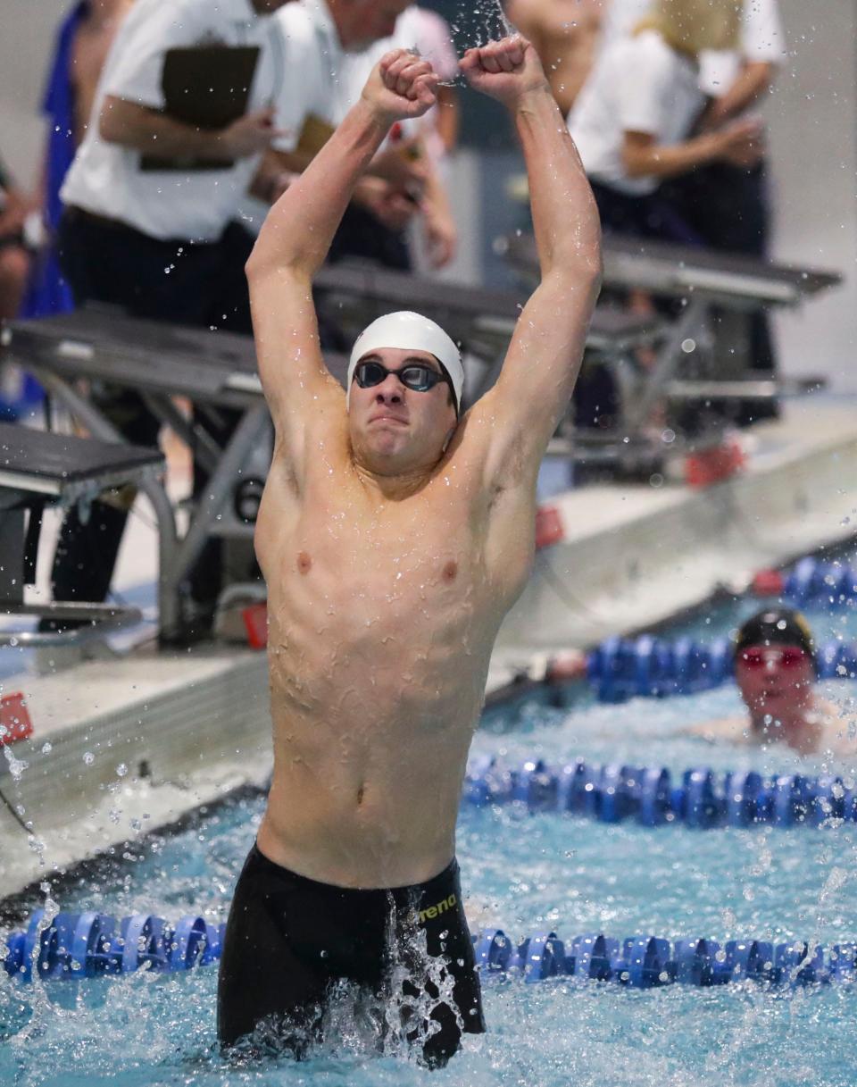 Appoquinimink's Zachary Redding celebrates his win in the 50 yard freestyle during the DIAA boys swimming state championships in the Rawstrom Natatorium at the University of Delaware, Saturday, Feb. 25, 2023.