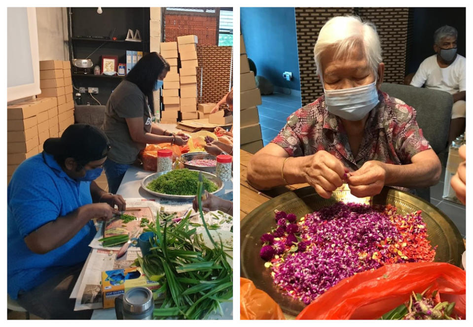 The young and old making Bunga Rampeh by slicing pandan leaves and plucking flowers into small pieces. — Picture via Shanmugam Raja.