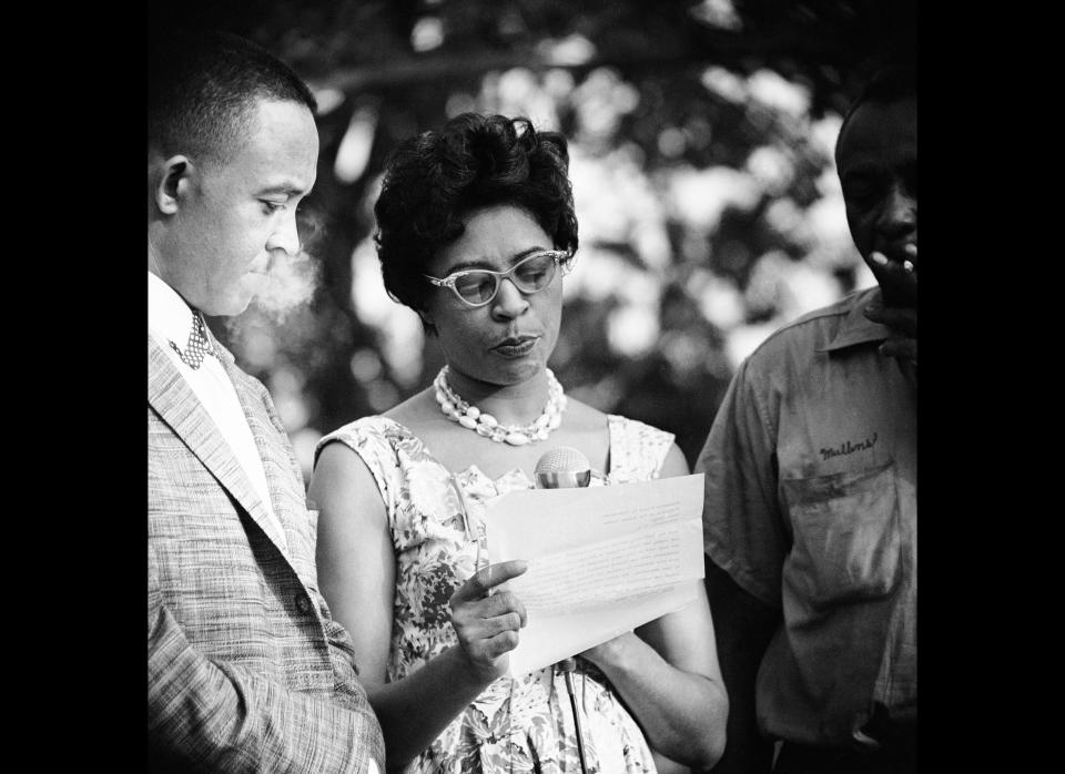 Mrs. L.C. (Daisy) Bates, state President of the NAACP is shown on Aug. 13, 1959 in Little Rock, Ark., as she reads a telegram she sent to President Eisenhower appealing for protection. (AP)