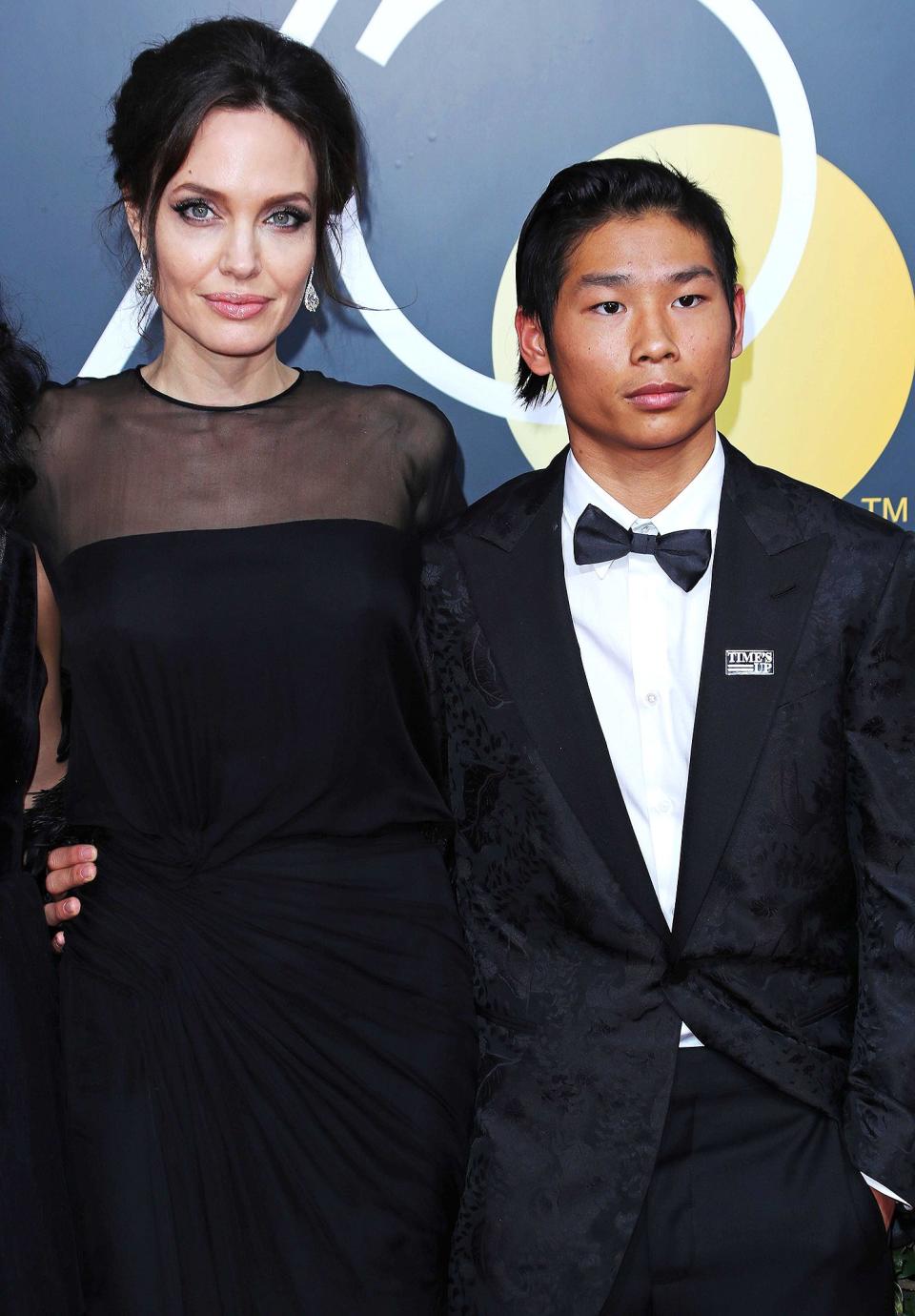 Pax scored the VIP role of date for <a href="http://people.com/babies/golden-globes-2018-angelina-jolie-son-pax-red-carpet/" rel="nofollow noopener" target="_blank" data-ylk="slk:Mom's outing at the Jan. 7, 2018, Golden Globe Awards;elm:context_link;itc:0;sec:content-canvas" class="link ">Mom's outing at the Jan. 7, 2018, Golden Globe Awards</a> in L.A., at which Jolie's film <em>First They Killed My Father</em> was nominated for best motion picture - foreign language. 