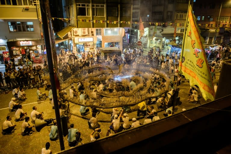 Participants take part in the annual Tai Hang "fire dragon" event, one of the highlights of the city's mid-autumn festival, in Hong Kong