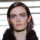 <b>Erdem <br></b><br>Models' eyes were lined with red kohl and their lips were left bare.<br><br>Image © Getty