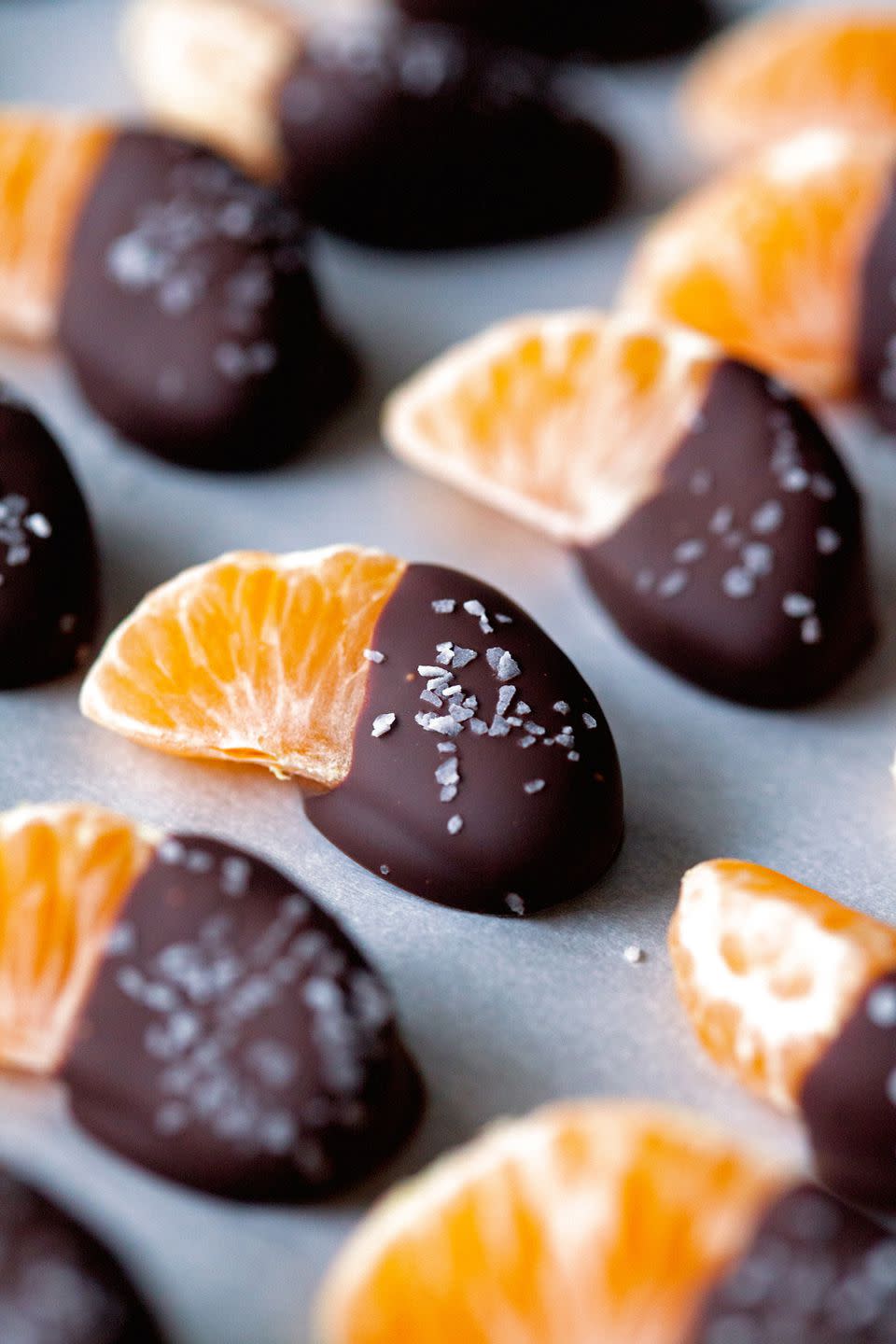 <p>One easy way to get your kids to eat more fruit? Cover it in chocolate. These dressed-up mandarin oranges are so good you'll eat 'em up too.</p><p><strong>Get the recipe at <a rel="nofollow noopener" href="http://deliciouslyyum.com/salted-chocolate-dipped-mandarin-slices/" target="_blank" data-ylk="slk:Deliciously Yum.;elm:context_link;itc:0;sec:content-canvas" class="link ">Deliciously Yum.</a></strong></p>