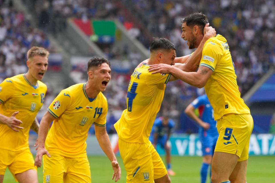 Celebration: Roman Yaremchuk came off the bench to score Ukraine’s winner against Slovakia (AP)