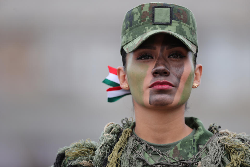 VARIOUS CITIES, MEXICO - SEPTEMBER 16: Mexican soldier poses during the Independence Day military parade at Zocalo Square on September 16, 2020 in Various Cities, Mexico. This year El Zocalo remains closed for general public due to coronavirus restrictions. Every September 16 Mexico celebrates the beginning of the revolution uprising of 1810. (Photo by Hector Vivas/Getty Images)