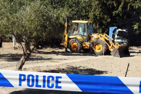 A bulldozer excavates a site during an investigation for Ben Needham, a 21-month-old British toddler who went missing in 1991, on the island of Kos, Greece, September 27, 2016. REUTERS/Vassilis Triandafyllou