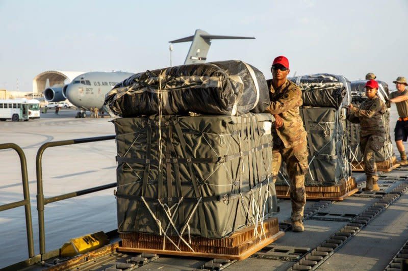 U.S. soldiers load aid platforms onto a plane to be airdropped for Palestinian civilians in Gaza. Photo courtesy of U.S. Central Command