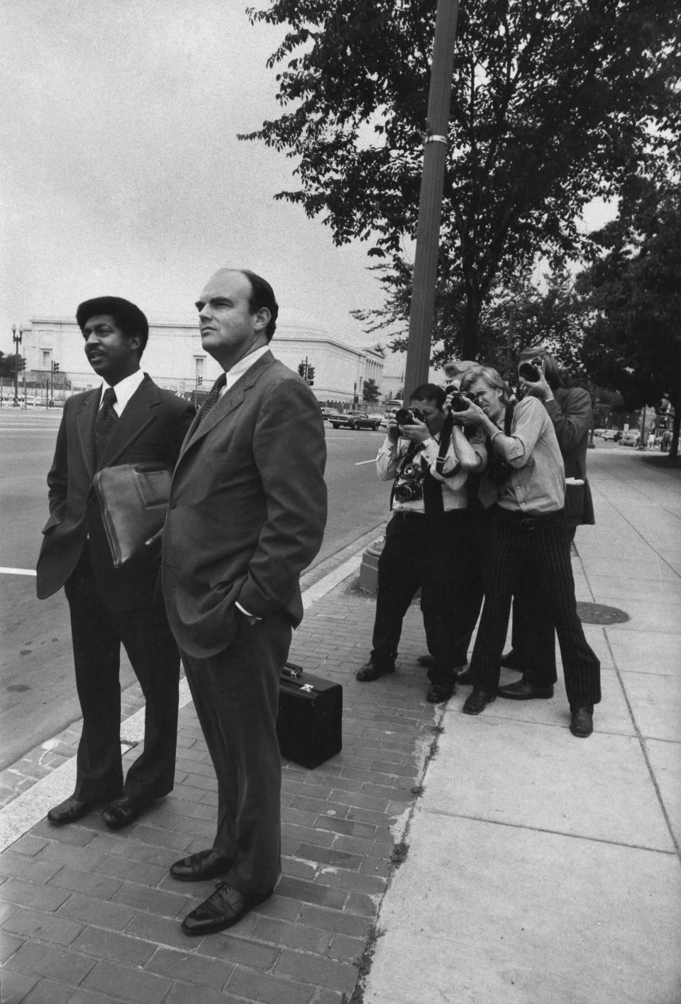 WASHINGTON - NOVEMBER:  (NO U.S. TABLOID SALES)  Former Senior Advisor to President Richard Nixon, John Ehrilchman waits for a cab in front of the Federal courthouse after testifying in the Watergate scandal on November 1973 in Washington DC. Ehrilchman was indited for Watergate Crimes.  (Photo by David Hume Kennerly/Getty images)