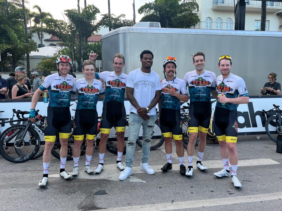 Los Angeles Chargers safety Derwin James (middle), an investor in the National Cycling League, poses for a photo with members of the Texas Roadhouse men's team after the first National Cycling League event in Miami Beach, Fla. on Saturday, April 10, 2023.