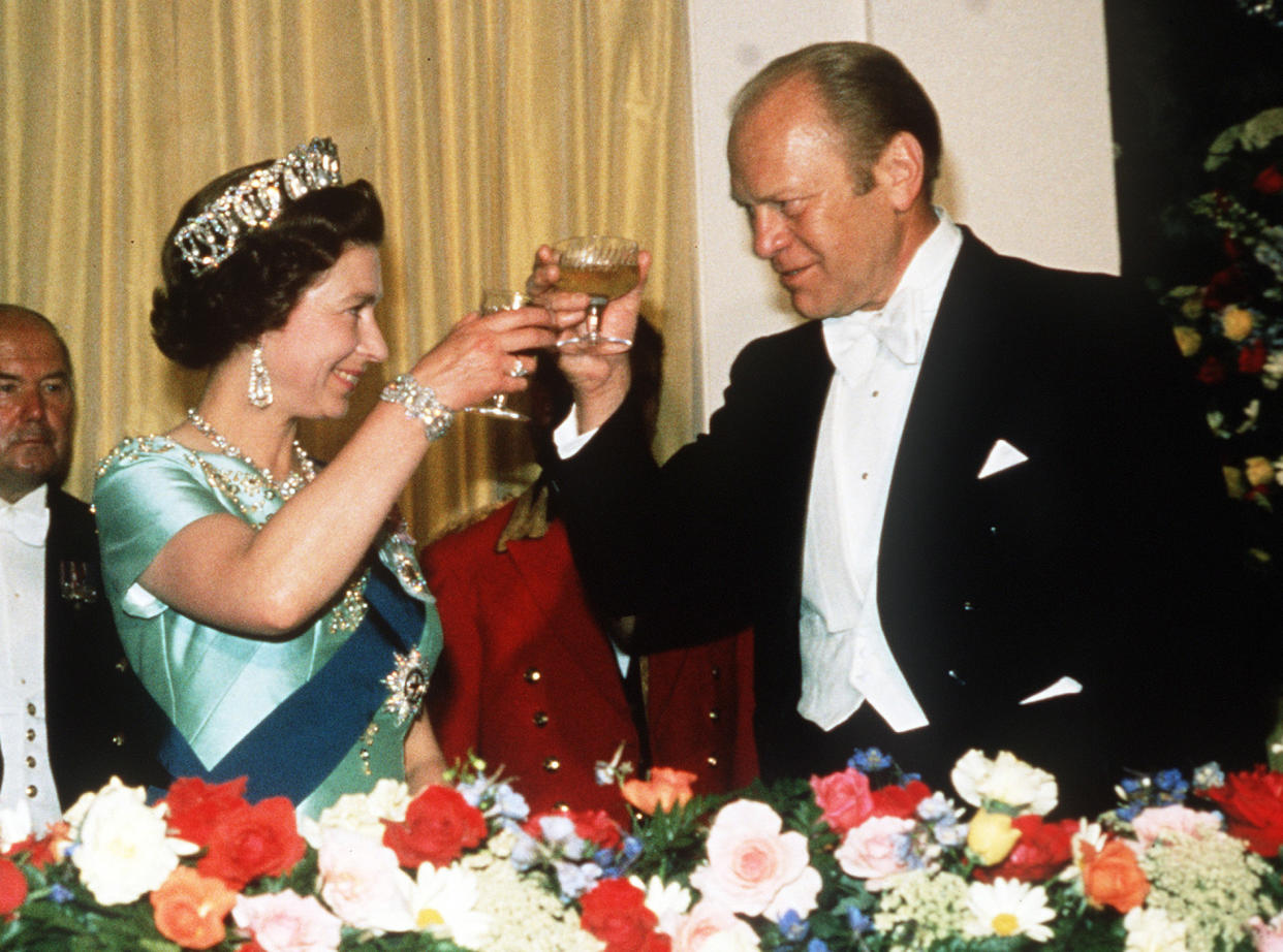 Queen Elizabeth ll toasts President Gerald Ford during a State Visit to the USA in July, 1976.  EMPICS Entertainment Photo.