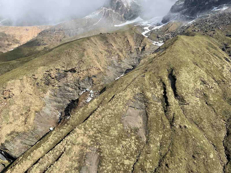 A general view of a Tara Air plane crash site during the rescue operation at Thasang, Nepal
